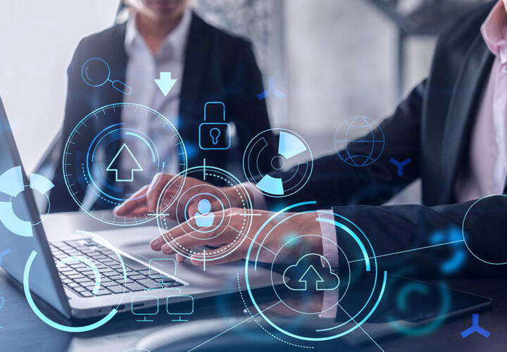 Consultants working on a laptop